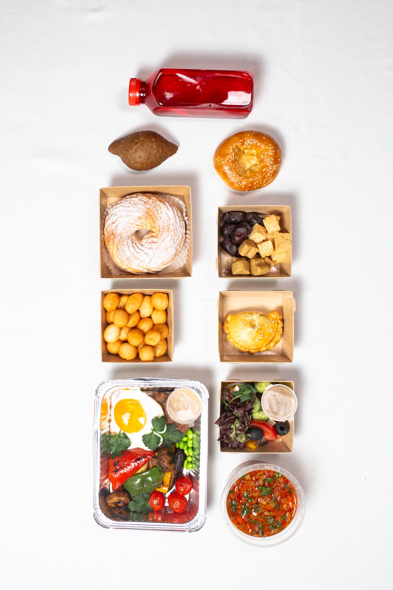 Assorted packaged meal kits laid out